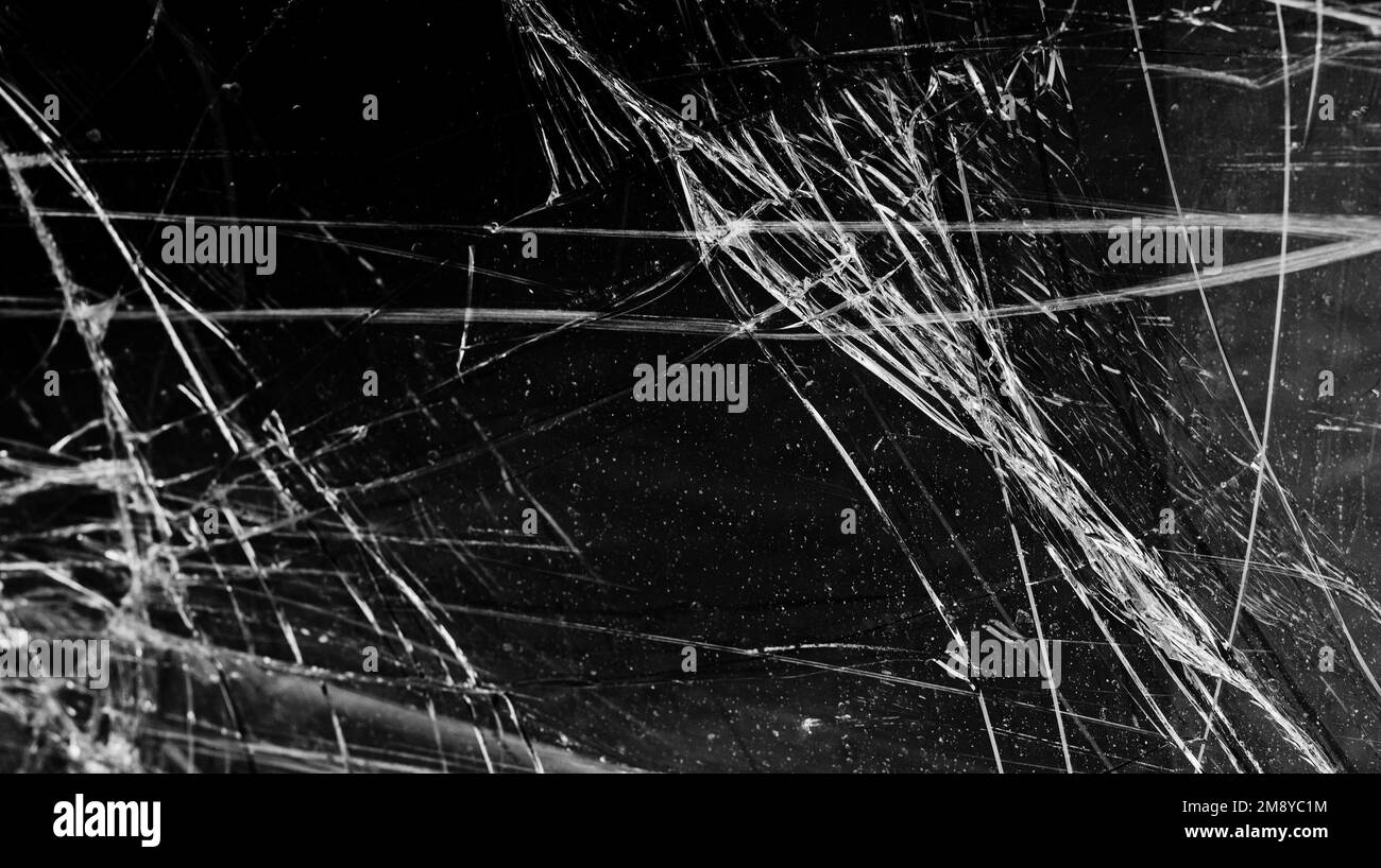fissures sur la texture du verre verre verre brisé. arrière-plan. fenêtres cassées Banque D'Images