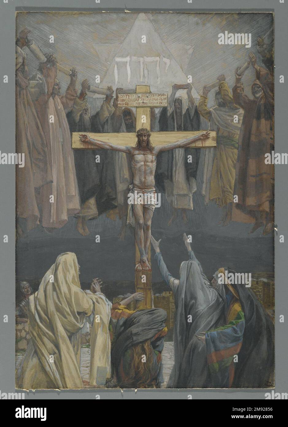 Il est fini (Consumatum est) James Tissot (français, 1836-1902). Il est fini (Consumatum est), 1886-1894. Aquarelle opaque sur graphite sur papier vélin gris, image : 11 5/16 x 7 3/4 po. (28,7 x 19,7 cm). Comme Jésus expire sur la croix, il dit les mots « c'est fini ». Dans cette image, les esprits des prophètes de l'ancien Testament se déplacent autour de la barre transversale de son crucifix, l'accueillant dans leur compagnie. Au sein de l'étoile à six pointes de David, Tissot a peint le mot hébreu pour Seigneur, soulignant encore davantage le rôle du Christ dans le plan divin. Affirmant que leurs « prophéties sont accomp Banque D'Images