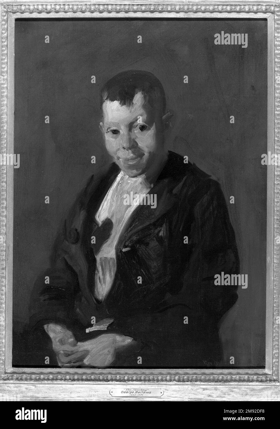 The Newsboy George Wesley Bellows (américain, 1882-1925). The Newsboy, 1908. Huile sur toile, 29 15/16 x 21 7/8 in. (76 x 55,5 cm). Comme son professeur et collègue Robert Henri, George Bellows gravitait autour de la description des enfants comme des « types » urbains. Ici, il décrit un newsboy de classe ouvrière, un sujet populaire pour les artistes, les photographes documentaires et les écrivains vers le tournant du XXe siècle. Le brushwork énergique donne l'impression d'un personnage plein d'énergie, mais le portrait de Bellows de son sitter, un enfant irlandais simplement identifié comme Jimmy Flannigan dans le livre de l'artiste, lui aussi Banque D'Images