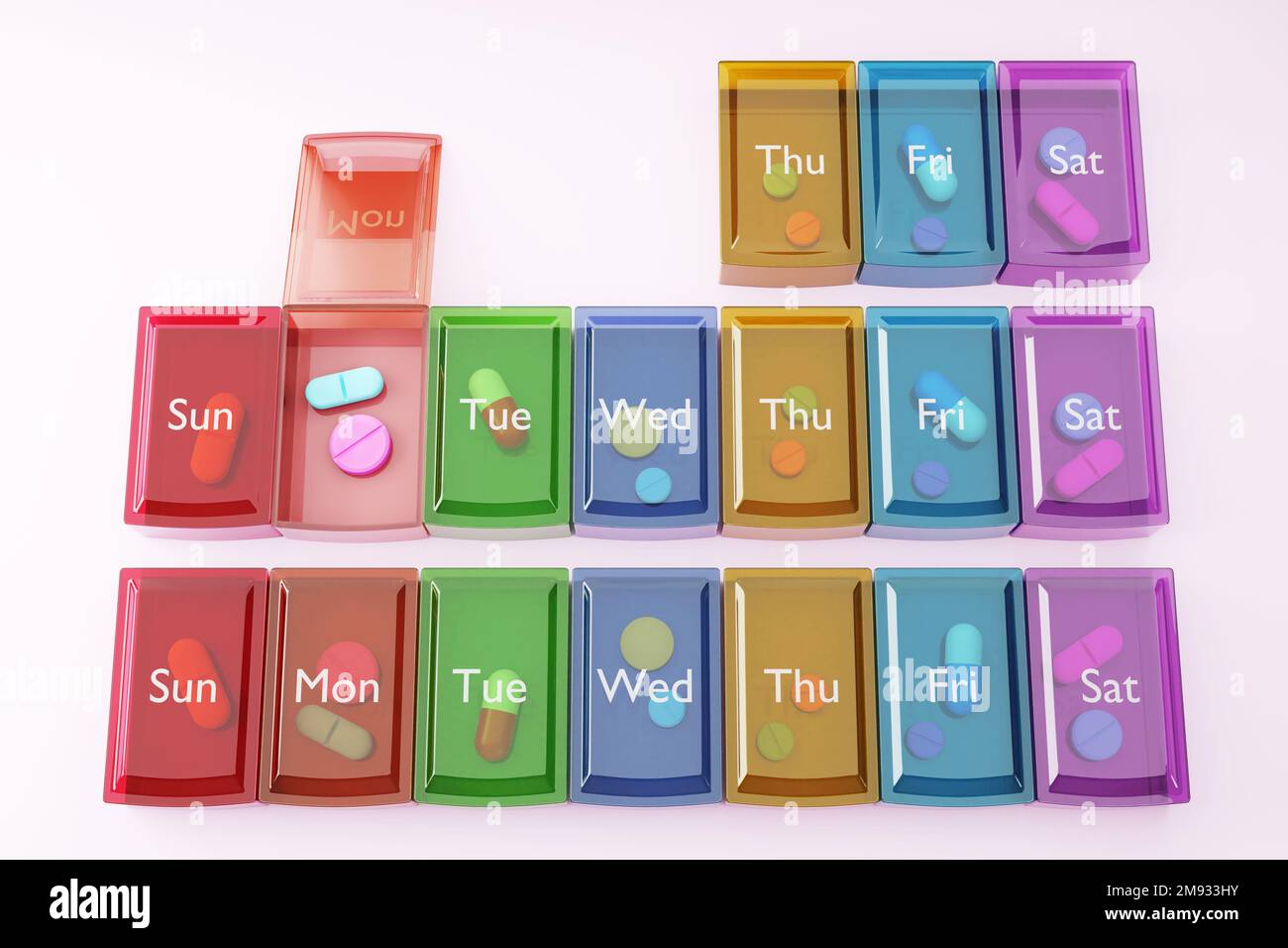 Organiseur coloré de pilules entièrement rempli de médicaments, de comprimés et d'antibiotiques.le concept des prescriptions, des pharmacies et de l'industrie pharmaceutique Banque D'Images