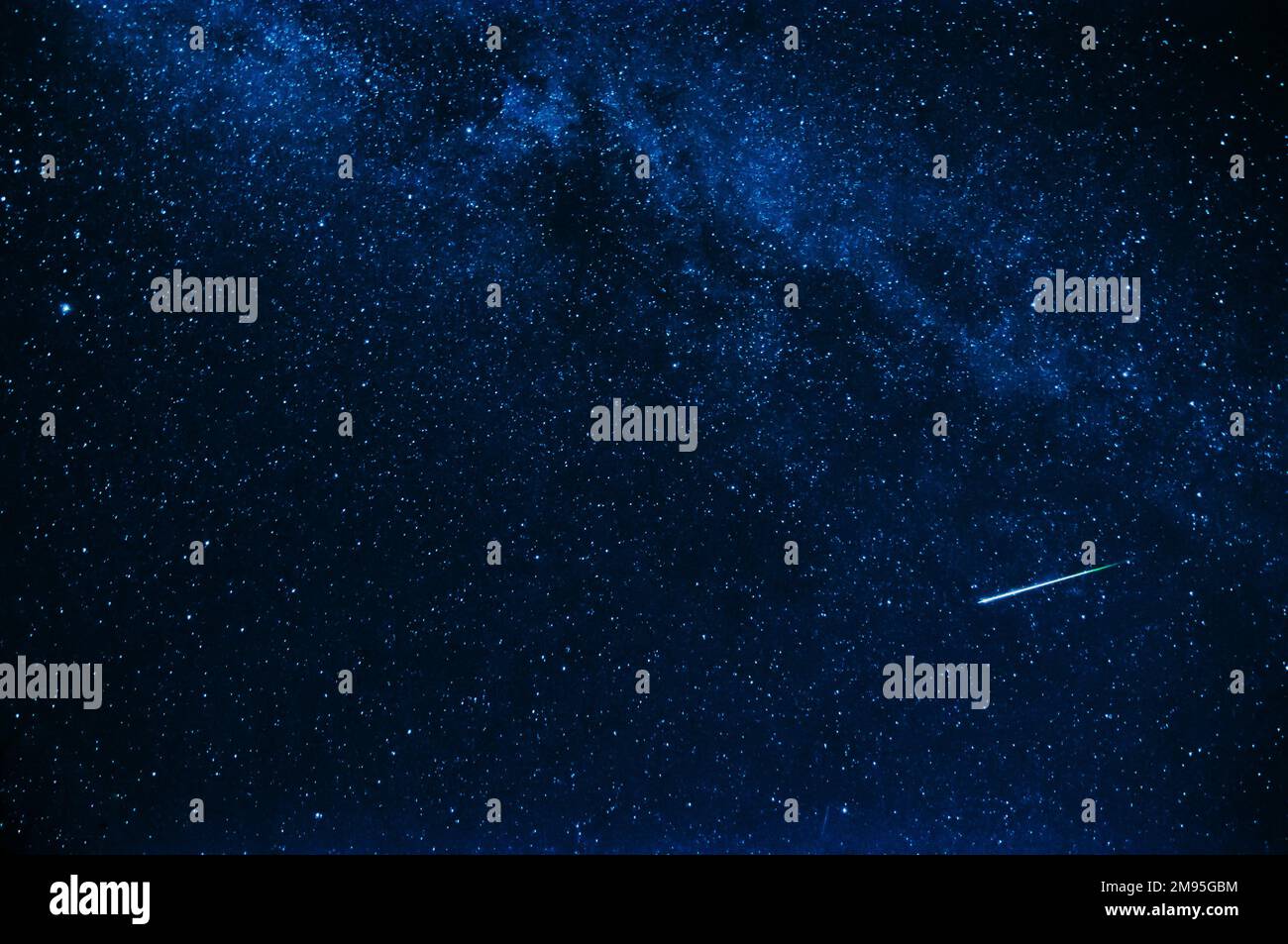 tir d'étoile en arrière-plan un ciel bleu étoilé la nuit Banque D'Images