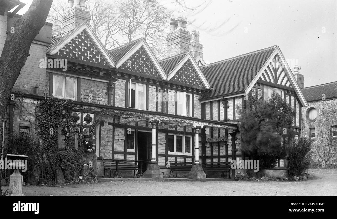 Nommé d'après une figure locale légendaire, le Peveril of the Peak Hotel est toujours en activité aujourd'hui, peu changé plus de 100 ans après la prise de cette photo Banque D'Images