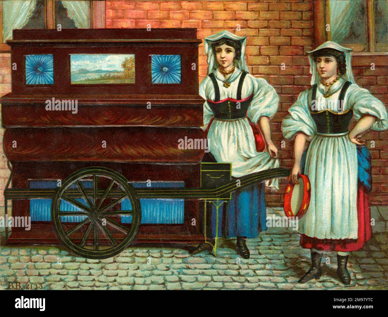 Victorian Scrap - deux jeunes femmes avec un orgue de canon de rue. Banque D'Images