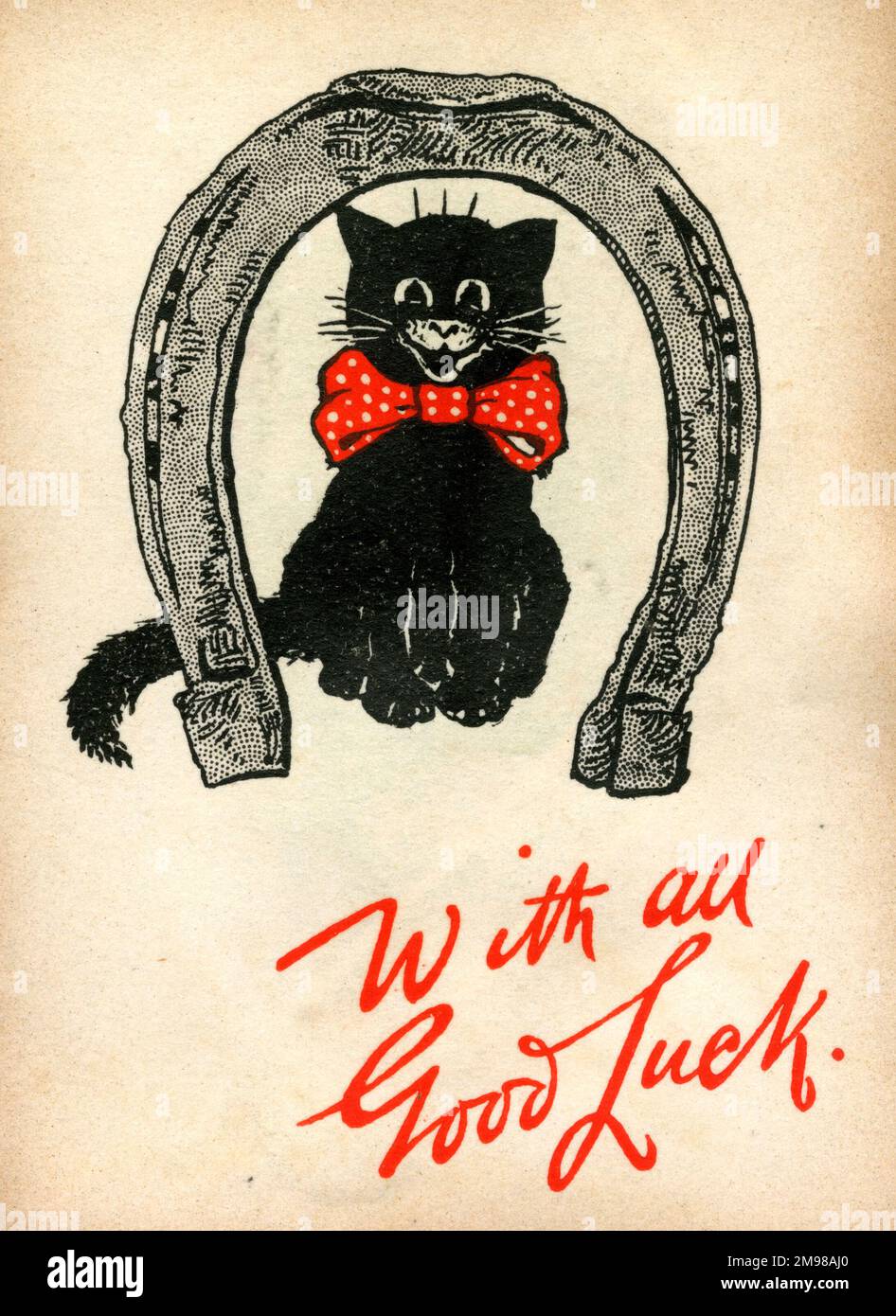 Carte de bonne chance, chat noir en fer à cheval. Banque D'Images
