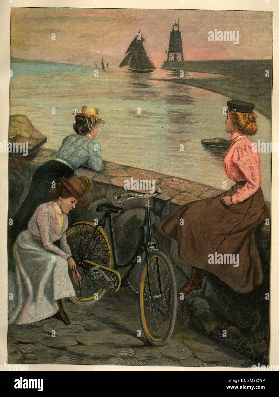 Femmes cyclistes appréciant une soirée tranquille sur la jetée de Swinemunde (Swinoujscie), un port sur la mer Baltique, nord-ouest de la Pologne, près de la frontière avec l'Allemagne. Banque D'Images