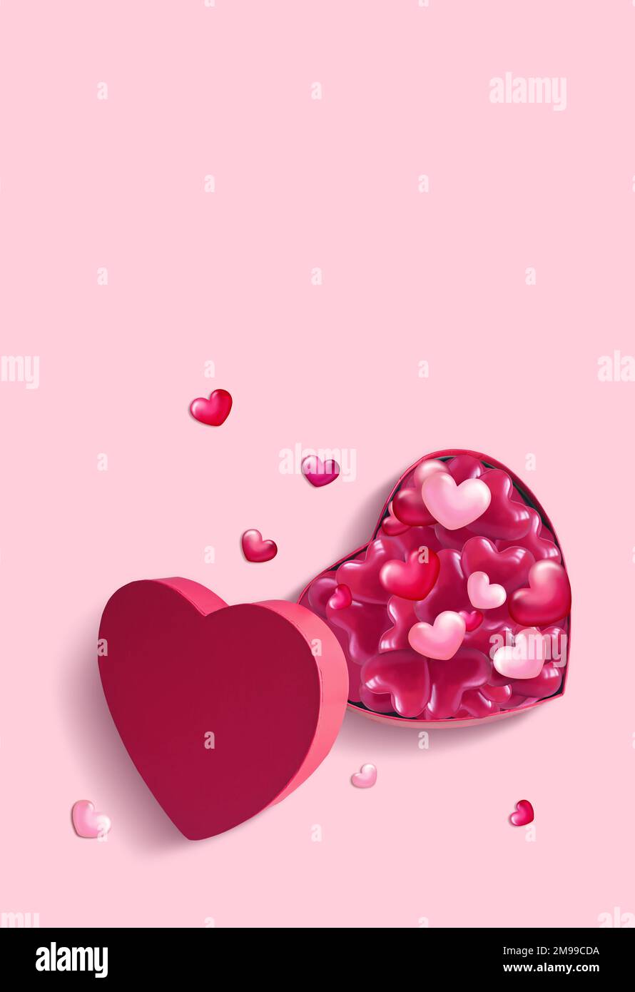Boîte cadeau ouverte en forme de coeur rose avec coeurs sur fond rose. Design pour la Saint-Valentin. Banque D'Images