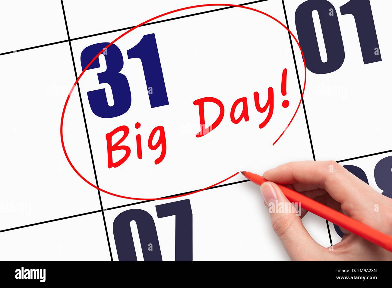 31st jour du mois. Écrire du texte à la main LE GRAND JOUR et faire le tour de la date du calendrier. Entreprise. Concept du jour de l'année. Banque D'Images