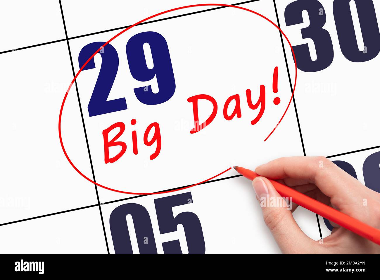 29th jour du mois. Écrire du texte à la main LE GRAND JOUR et faire le tour de la date du calendrier. Entreprise. Concept du jour de l'année. Banque D'Images