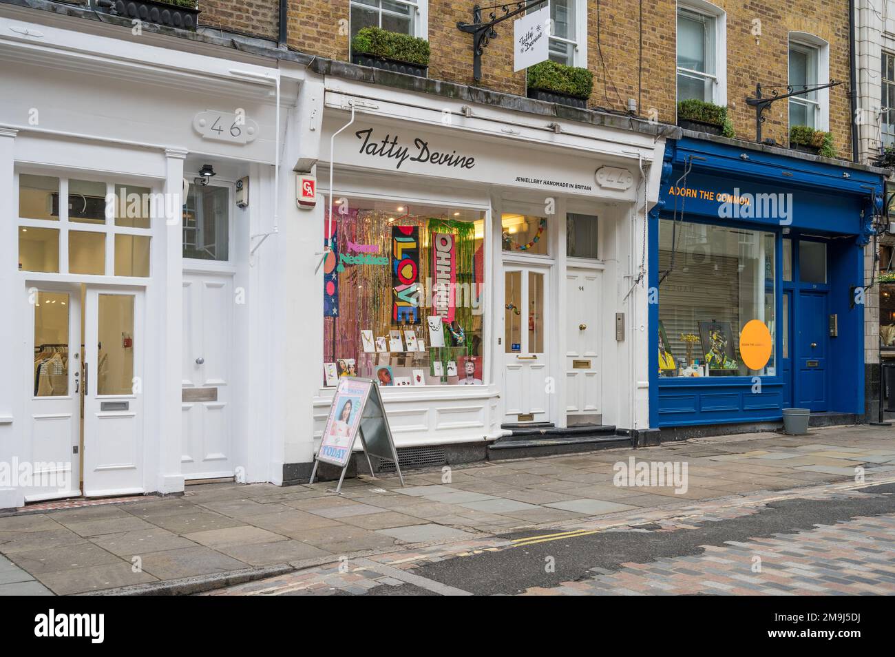 Tatty Devine, une boutique indépendante qui vend des bijoux d'art en perspex, en bois et en tissu. Monmouth Street, Seven Dials, Londres, Angleterre, Royaume-Uni Banque D'Images