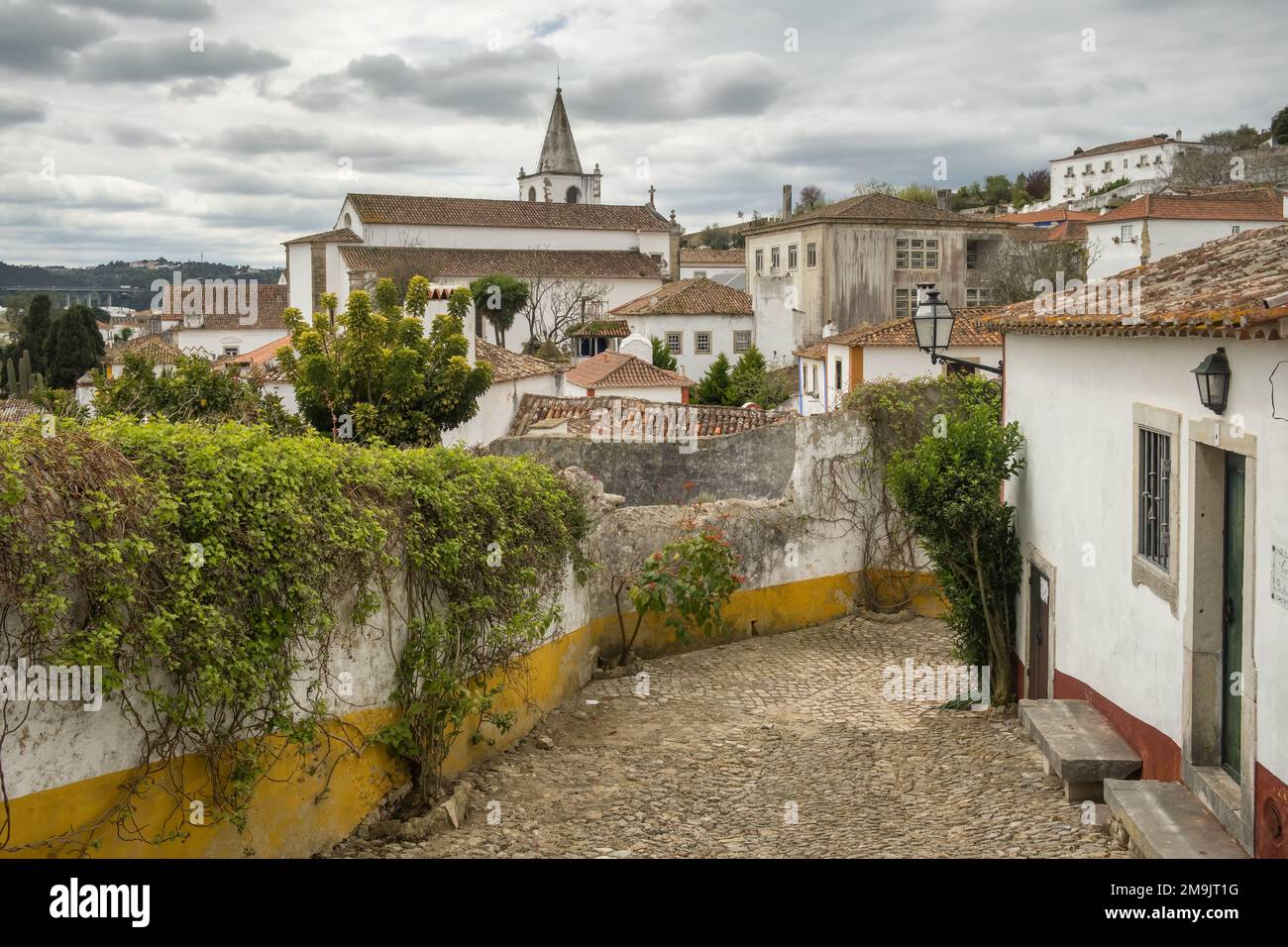 Rues historiques du château médiéval d'Obidos au Portugal. Banque D'Images