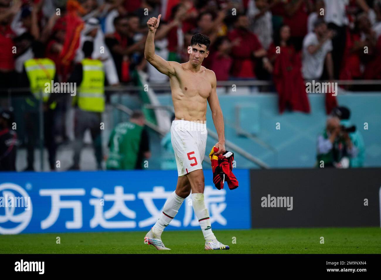 Morocco's Nayef Aguerd celebrates after beating Belgium 2-0 in a World Cup group F soccer match at the Al Thumama Stadium in Doha, Qatar, Sunday, Nov. 27, 2022. (AP Photo/Manu Fernandez) Banque D'Images