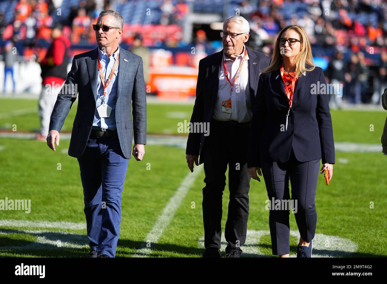 Denver Broncos owner and chief executive officer Greg Penner, from left, owner Rob Walton and owner Carrie Walton Penner before an NFL football game against the Las Vegas Raiders in Denver, Sunday, Nov. 20, 2022. (AP Photo/Jack Dempsey) Banque D'Images