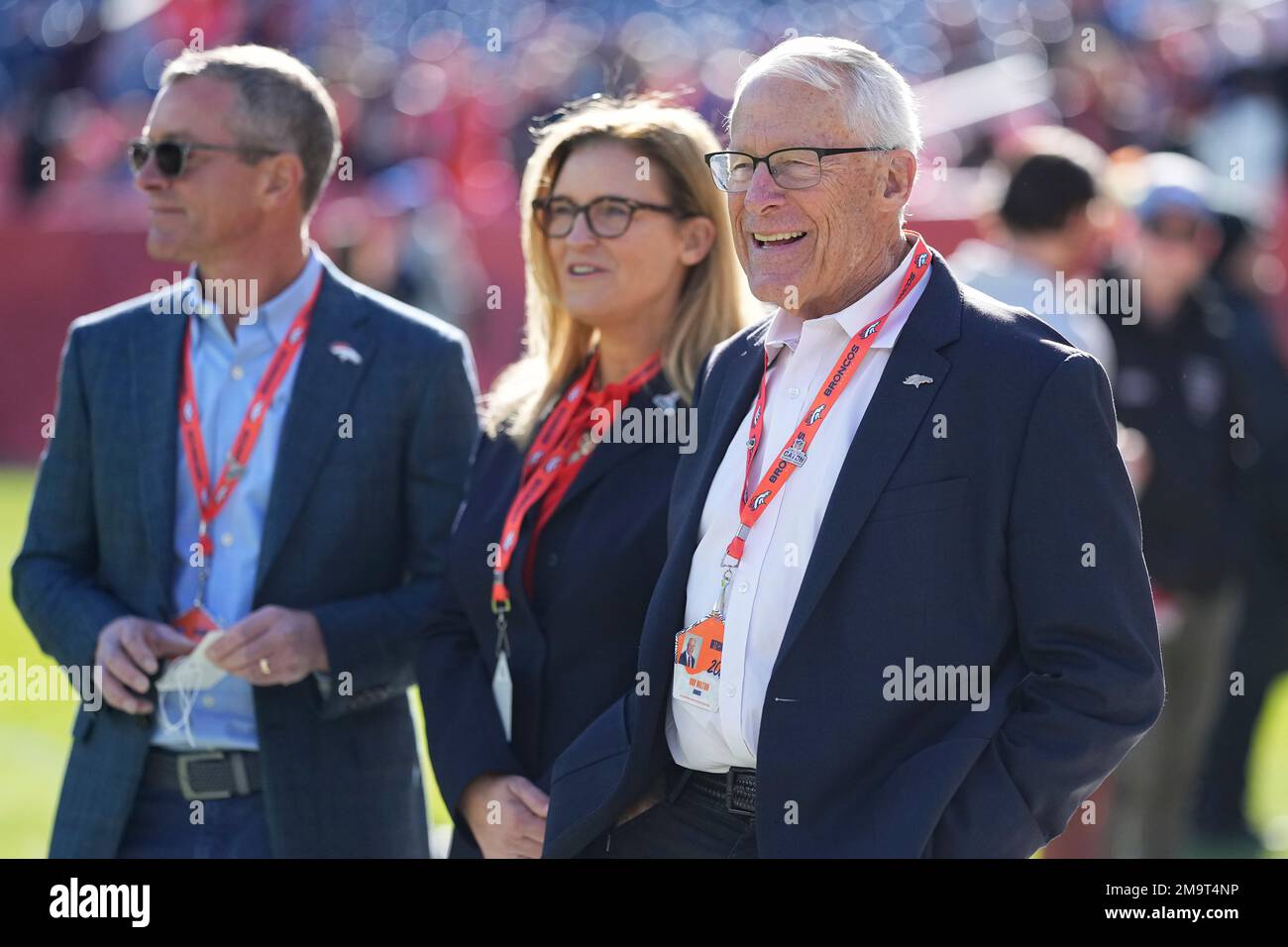 Denver Broncos owner and chief executive officer Greg Penner, from left, owner Carrie Walton Penner and owner Rob Walton before an NFL football game against the Las Vegas Raiders in Denver, Sunday, Nov. 20, 2022. (AP Photo/Jack Dempsey) Banque D'Images