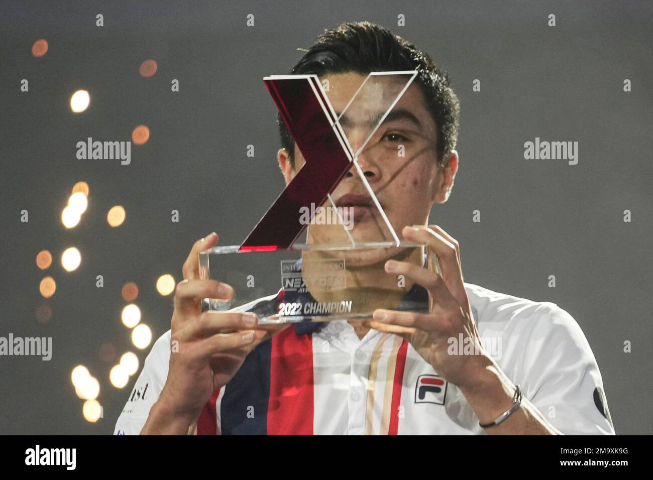 Winner United States' Brandon Nakashima holds a trophy during a medal ceremony for the ATP Next Gen tennis tournament after a final match against Czech Republic's Jiri Lehecka in Milan, Italy, Saturday, Nov. 12, 2022. (AP Photo/Luca Bruno) Banque D'Images