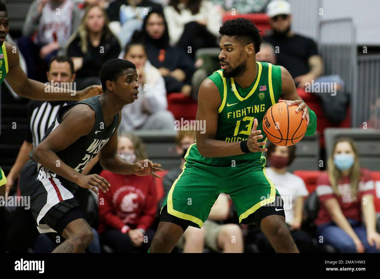 FILE Oregon forward Quincy Guerrier, right, controls the ball while