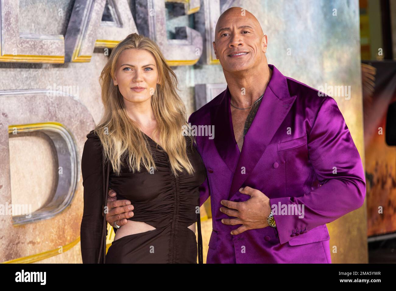 Ella Craig, left, and Dwayne Johnson a.k.a. The Rock pose for photographers upon arrival for the premiere of the film 'Black Adam' on Tuesday, Oct. 18, 2022, in London. (Photo by Vianney Le Caer/Invision/AP) Banque D'Images
