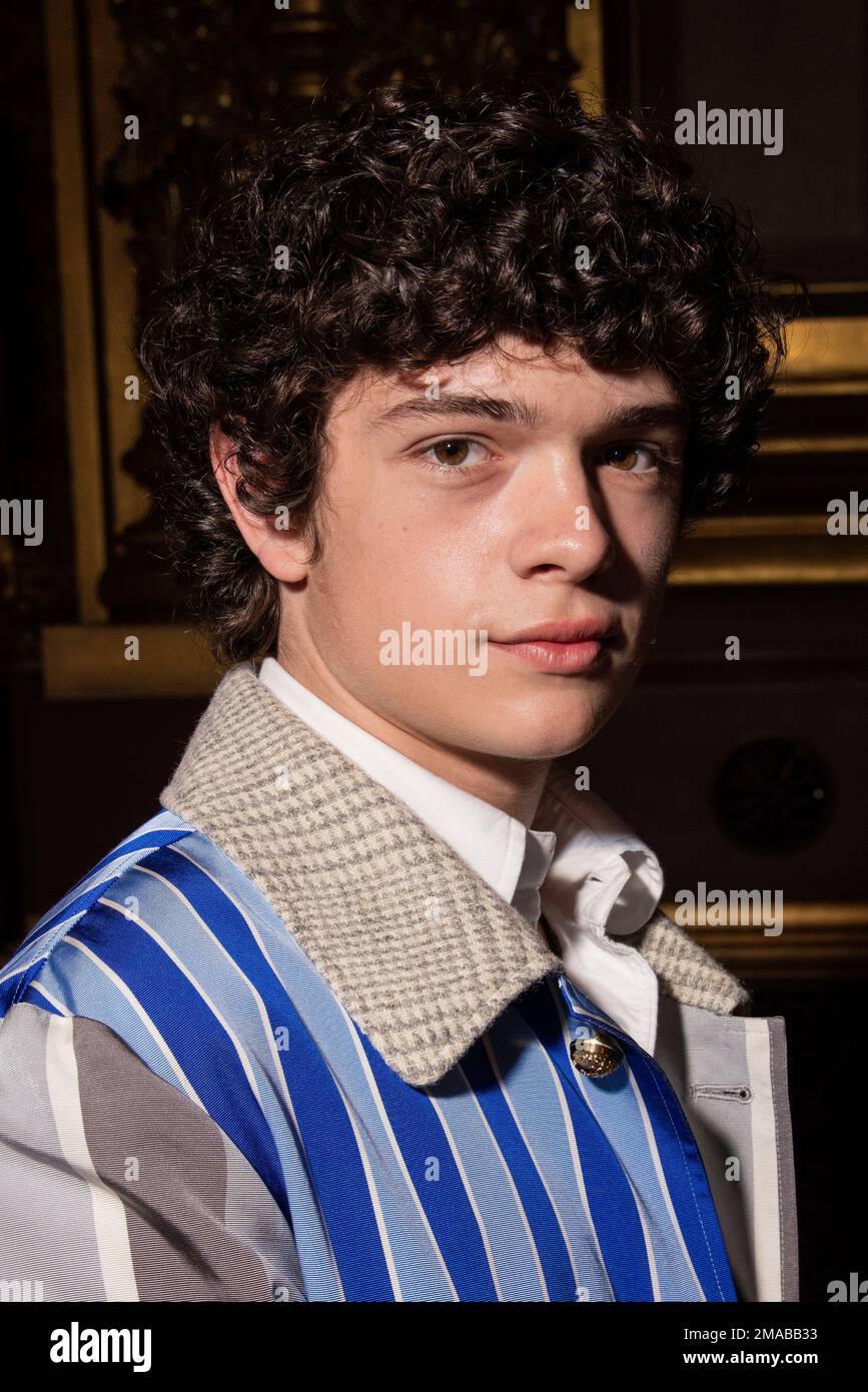 Noah Jupe attends the Thom Browne ready-to-wear Spring/Summer 2023 fashion  collection presented Monday, Oct. 3, 2022 in Paris. (Photo by Vianney Le  Caer/Invision/AP Photo Stock - Alamy