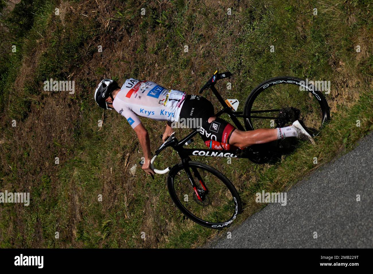 Slovenian Tadej Pogacar of UAE Team Emirates wearing the white jersey for  best young rider congratulates Dutch Mathieu van der Poel of Alpecin-Fenix  a Stock Photo - Alamy