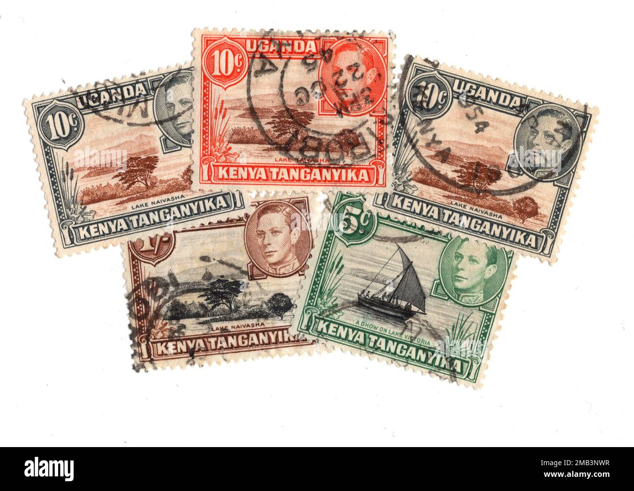 Timbres-poste d'époque du Kenya, de l'Ouganda et de Tanganyika sur fond blanc. Banque D'Images
