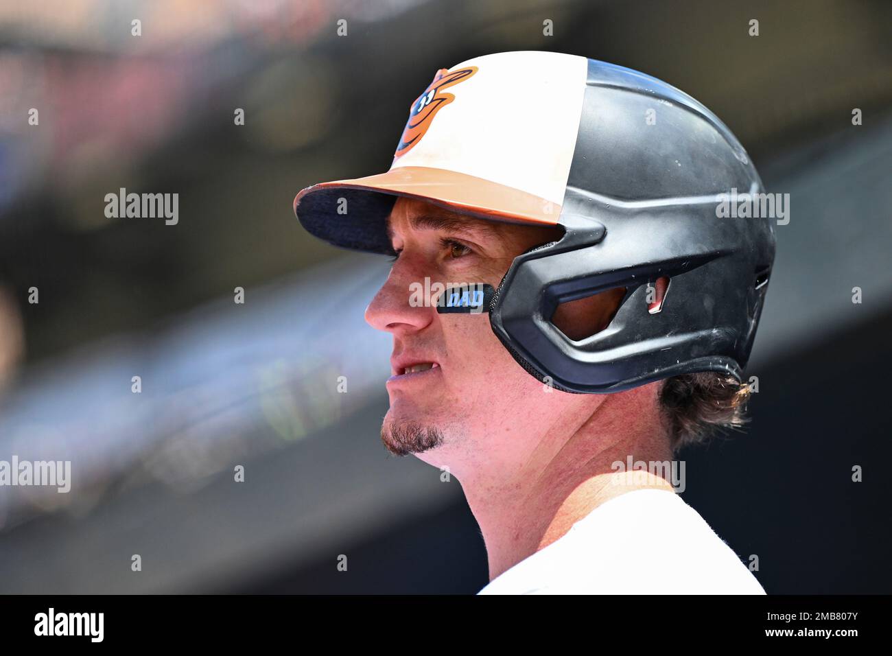 Baltimore Orioles' Austin Hays looks on from the dugout with eyeblack tape  that says Dad in honor of Father's Day during a baseball game against the  Tampa Bay Rays, Sunday, June 19,