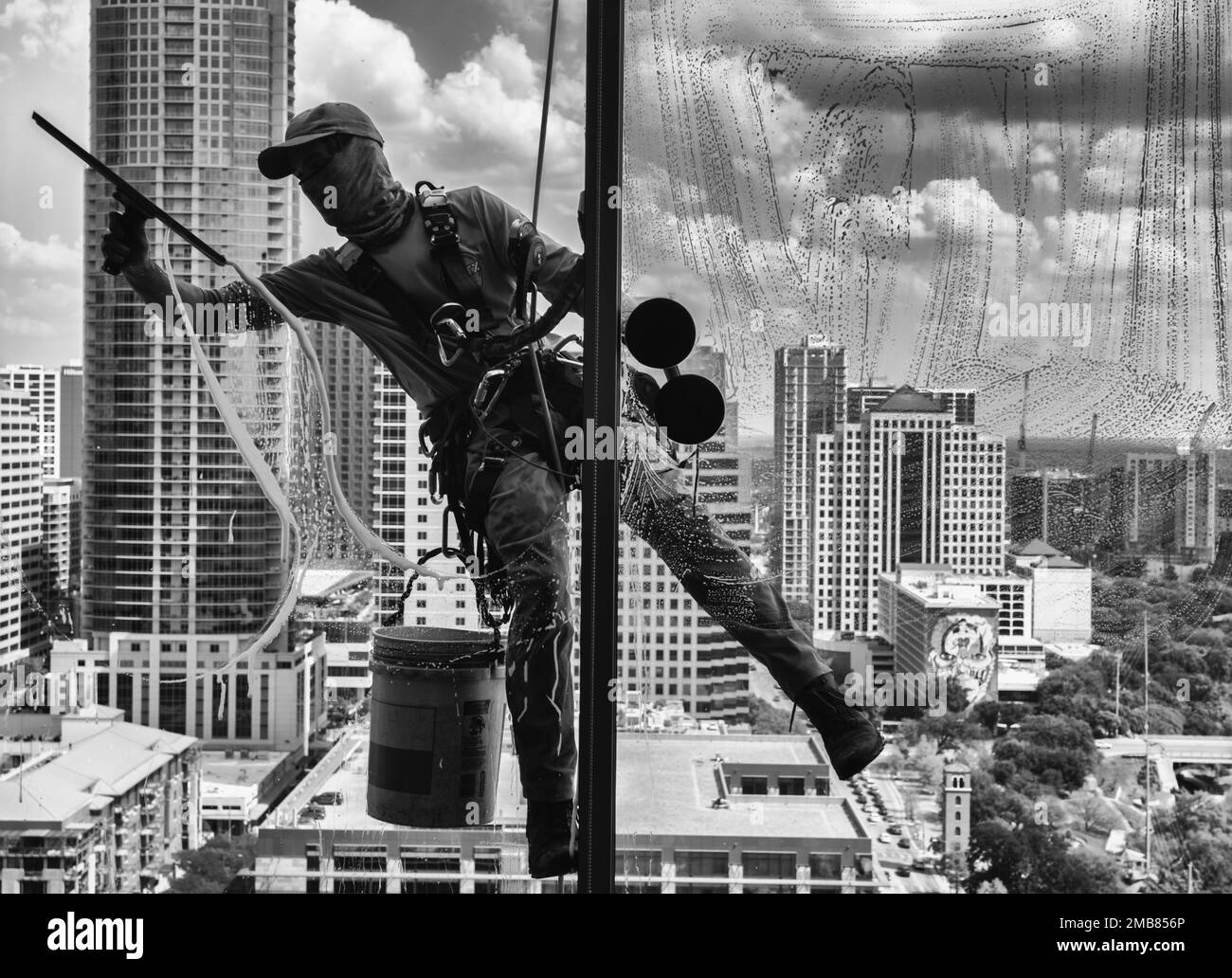 Lave-glace haut sur le bâtiment d'appartement avec Austin ville Skyline. Banque D'Images