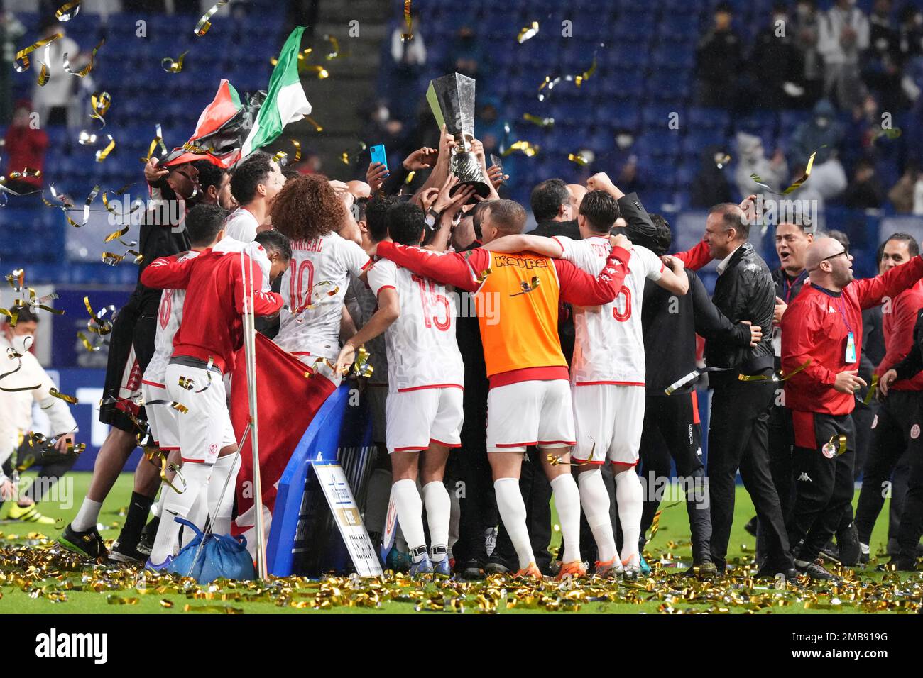 Tunisian players celebrate after winning the Kirin Cup soccer tournament in Suita, west Japan, Tuesday, June 14, 2022. (AP Photo/Eugene Hoshiko) Banque D'Images
