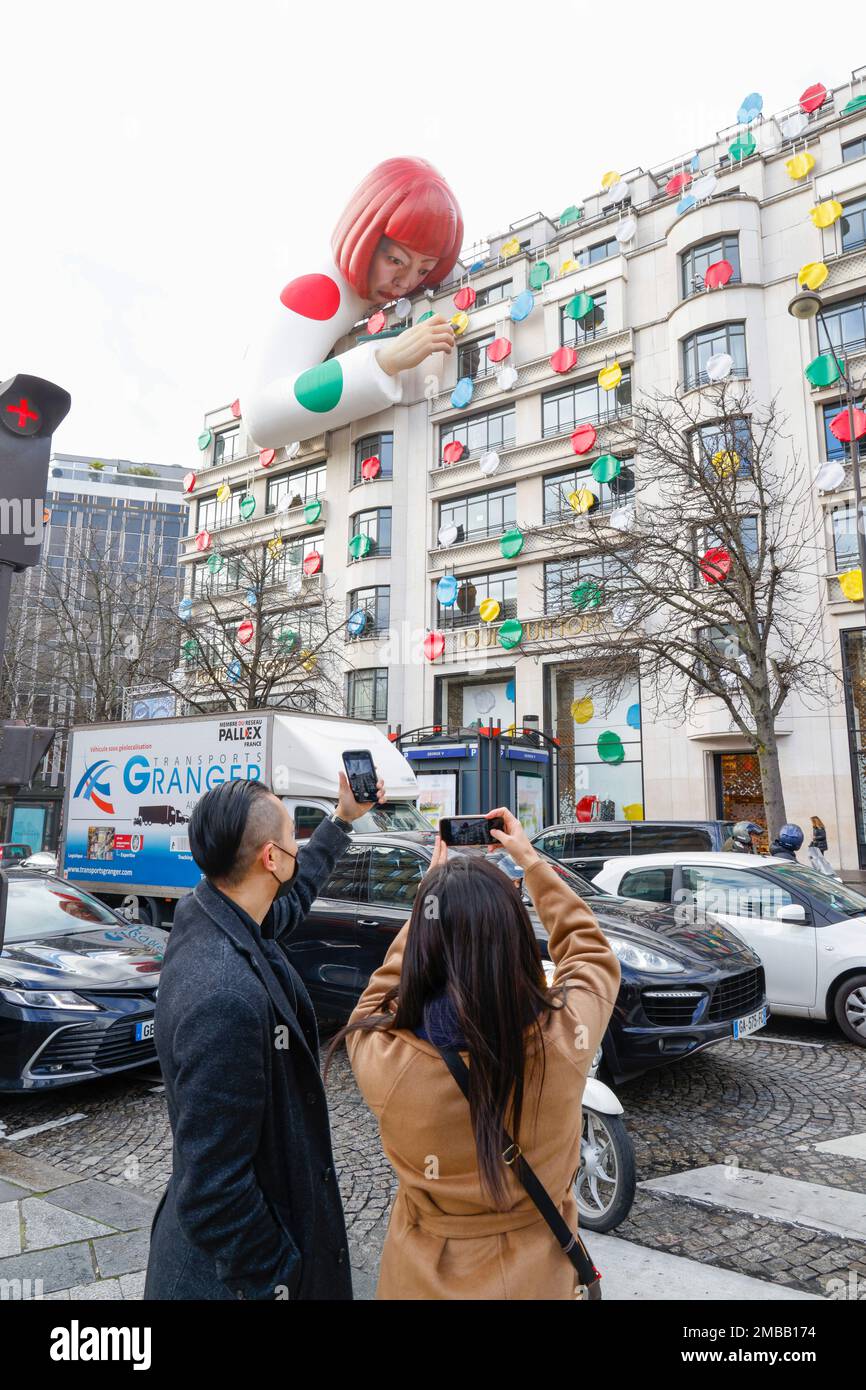 Yayoi Kusama Sculpture Peers Over Champs Elysées Louis Vuitton Store