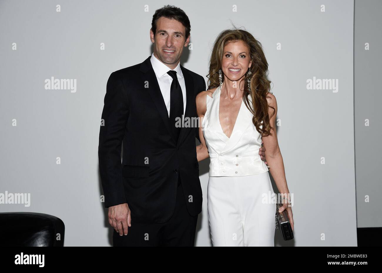 Dylan Lauren, right, and husband Paul Arrouet attend the Ralph Lauren  Fall/Winter 2022 fashion show at the Museum of Modern Art on Tuesday, March  22, 2022, in New York. (Photo by Evan