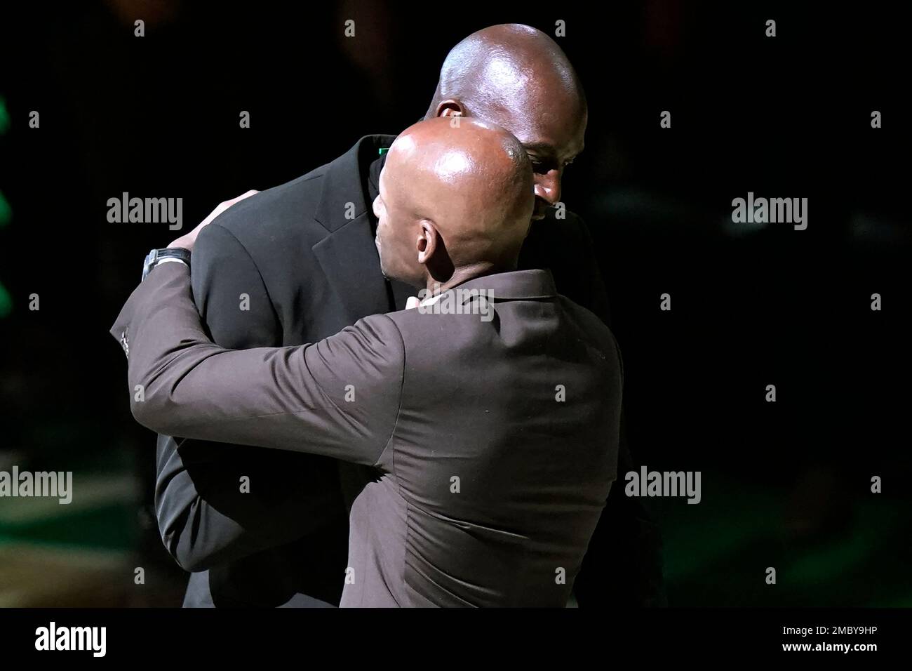 Former Boston Celtics players Ray Allen, front, and Kevin