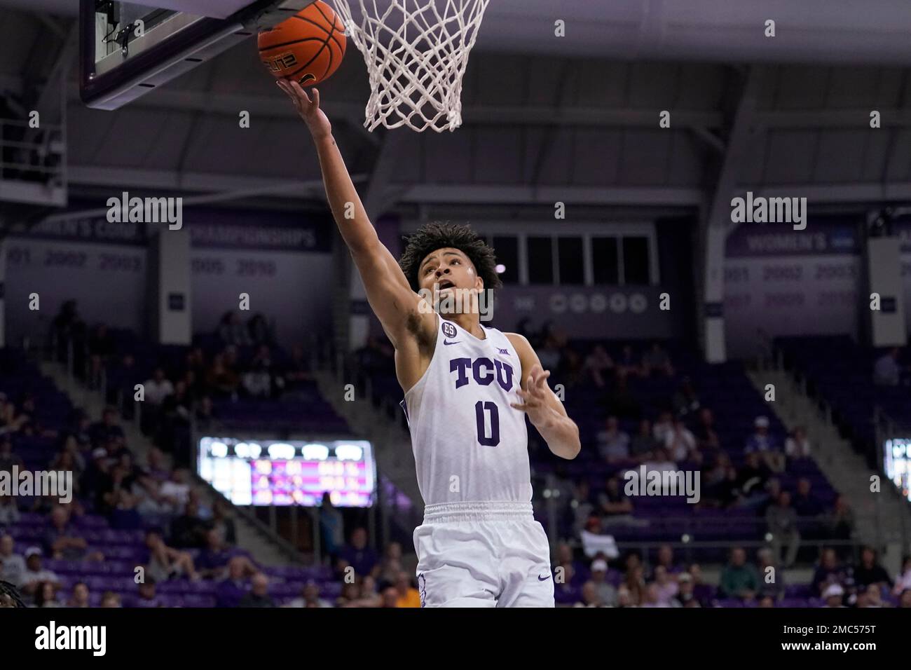 TCU guard Micah Peavy (0) goes up for an uncontested shot in the second