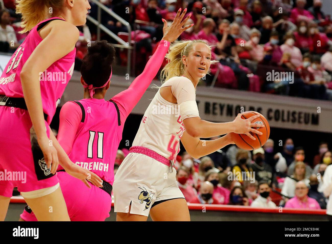 Georgia Tech's Digna Strautmane (45) tries to pass the ball around North Carolina State's Jakia Brown-Turner (11) during the first half of an NCAA college basketball game, Monday, Feb. 7, 2022, in Raleigh, N.C. (AP Photo/Karl B. DeBlaker) Banque D'Images