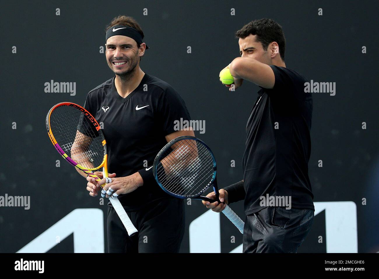Rafael Nadal of Spain (left) is seen during a doubles match with Jaume Munar of Spain against Tomas Martin Etcheverry and Sebastian Baez of Argentina at Summer Set tennis tournament ahead of the Australian Open in Melbourne, Australia, Tuesday, Jan. 4, 2022. (AP Photo/Hamish Blair) Banque D'Images