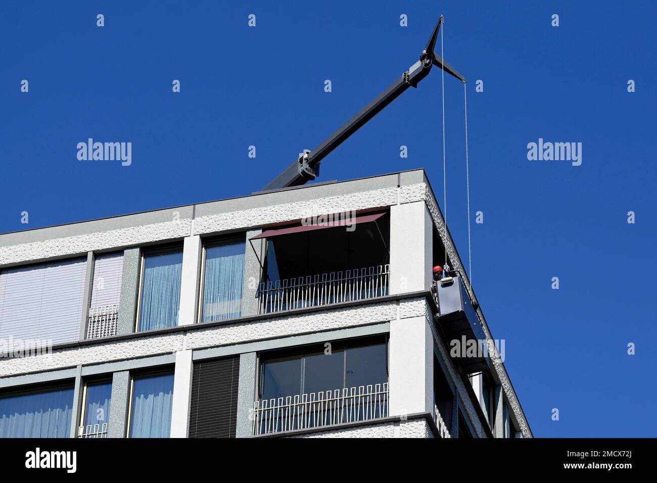 Immeuble avec ascenseur de façade, Zurich, Suisse Banque D'Images