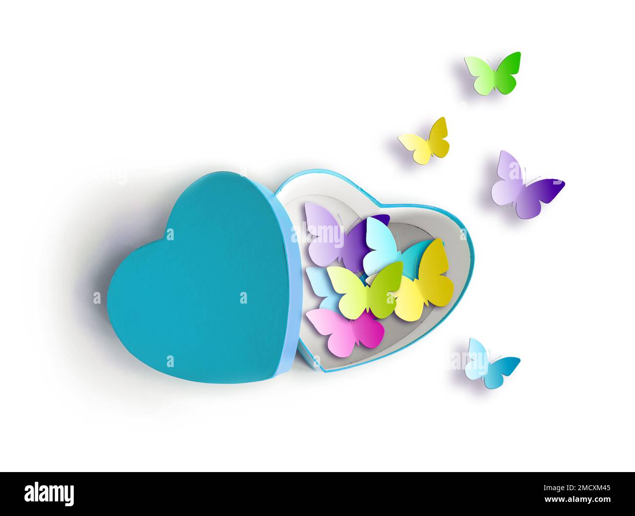Boîte cadeau ouverte en forme de coeur avec papillon coloré sur fond blanc. Design pour la Saint-Valentin. Banque D'Images