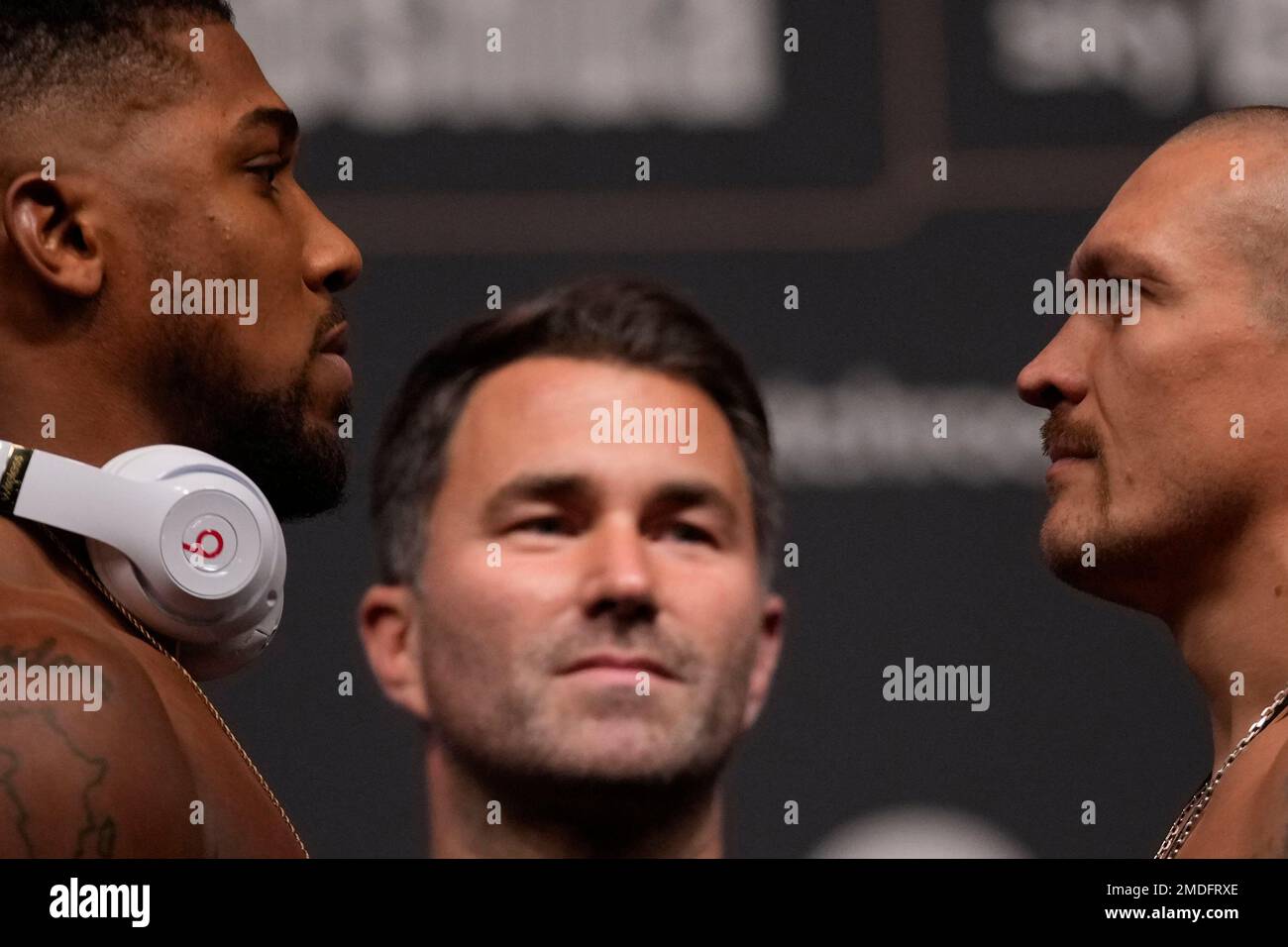 Britain's Anthony Joshua, left and Oleksandr Usyk of the Ukraine pose