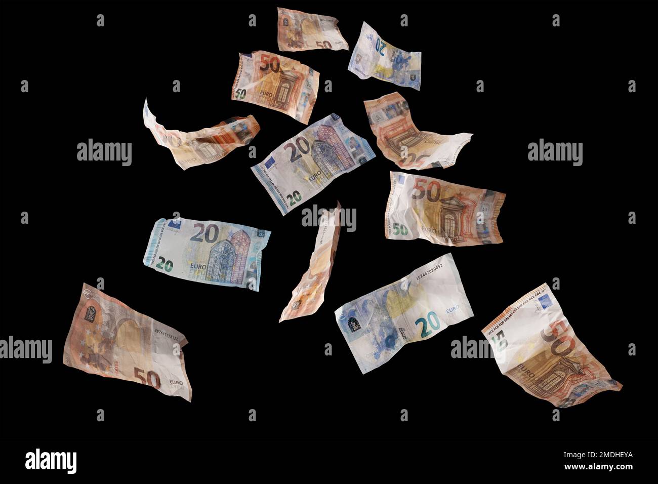 Voler de l'argent, vingt et cinquante billets en papier en monnaie euro à la baisse, isolé sur un arrière-plan, concept financier, succès d'affaires, investir Banque D'Images