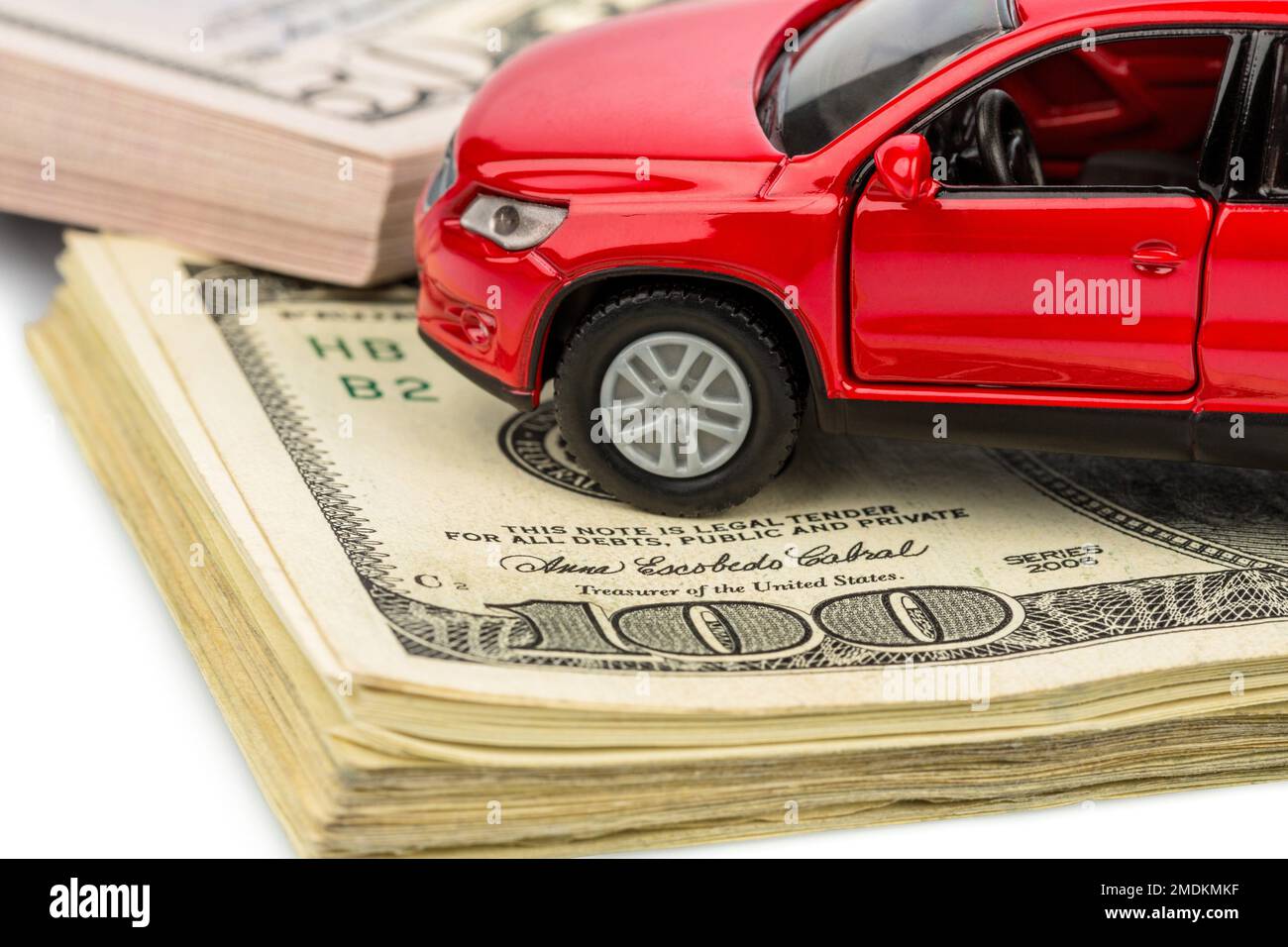 Voiture sur des factures de 100 dollars, composition Banque D'Images
