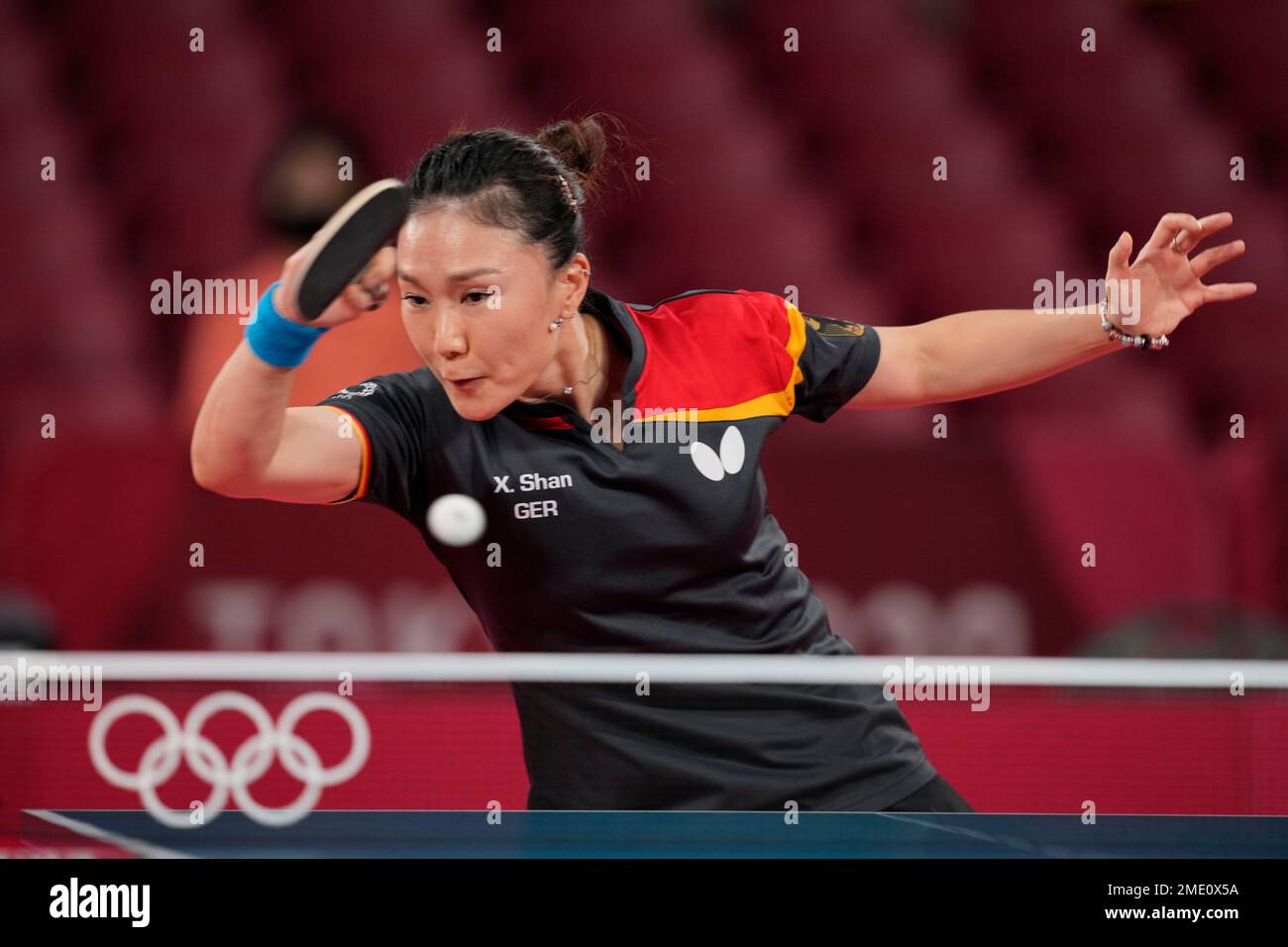 Germany's Shan Xiaona competes during the table tennis quarterfinal women's  team match against South Korea's Choi Hyo-joo at the 2020 Summer Olympics,  Tuesday, Aug. 3, 2021, in Tokyo. (AP Photo/Kin Cheung Photo