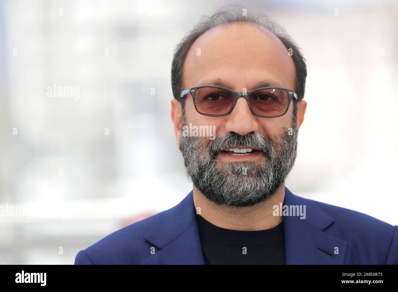Director Asghar Farhadi poses for photographers at the photo call for the film 'A Hero' at the 74th international film festival, Cannes, southern France, Wednesday, July 14, 2021. (Photo by Vianney Le Caer/Invision/AP) Banque D'Images