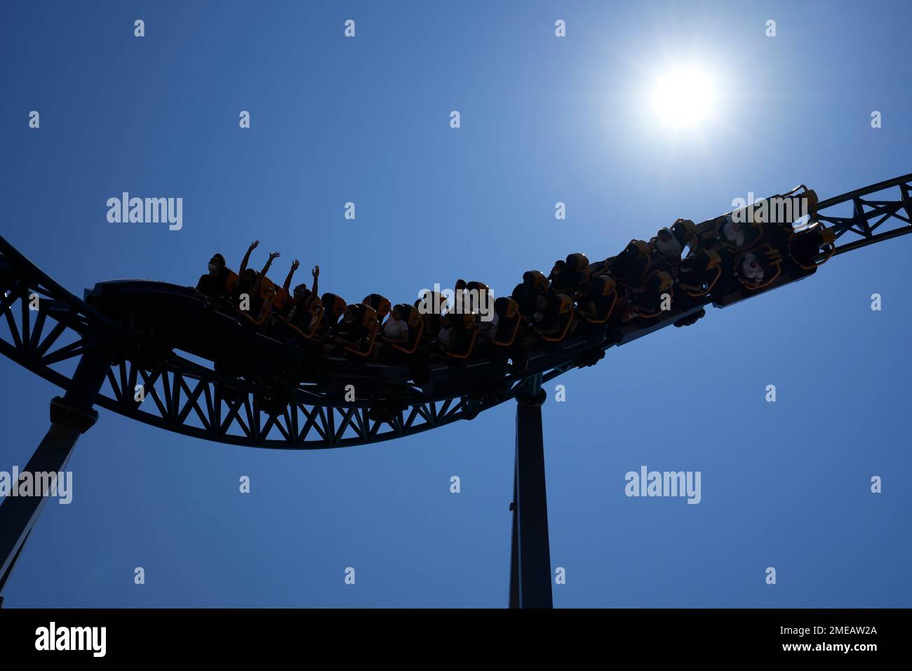 Visitors enjoy a ride on a roller coaster at Cinecitta World amusement park in the outskirts of Rome in the day of its reopening, Thursday, June 17, 2021. Amusement parks have been closed since Oct. 25 2020, when Italy's second national lockdown started. (AP Photo/Alessandra Tarantino) Banque D'Images