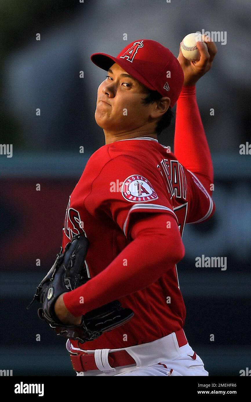 CORRECTS POSITION TO STARTING PITCHER INSTEAD OF DESIGNATED HITTER - Los Angeles Angels starting pitcher Shohei Ohtani throws to the plate during the first inning of a baseball game against the Tampa Bay Rays, Wednesday, May 5, 2021, in Anaheim, Calif. (AP Photo/Mark J. Terrill) Banque D'Images