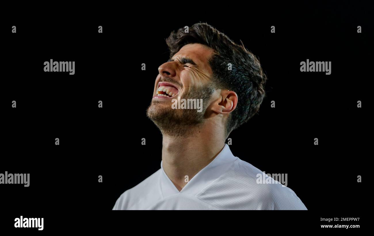 Real Madrid's Marco Asensio reacts during the Champions League quarterfinal first leg, soccer match between Real Madrid and Liverpool at the Alfredo di Stefano stadium in Madrid, Spain, Tuesday, April 6, 2021. (AP Photo/Manu Fernandez) Banque D'Images