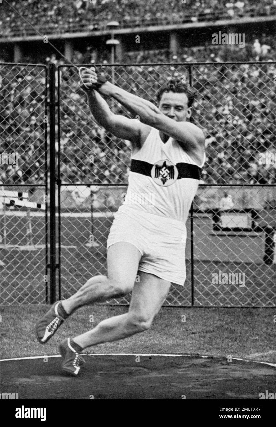 Karl Hein, Allemagne, est devenu champion olympique dans la course de marteau de 56, 49 mètres, médaille d'or Banque D'Images