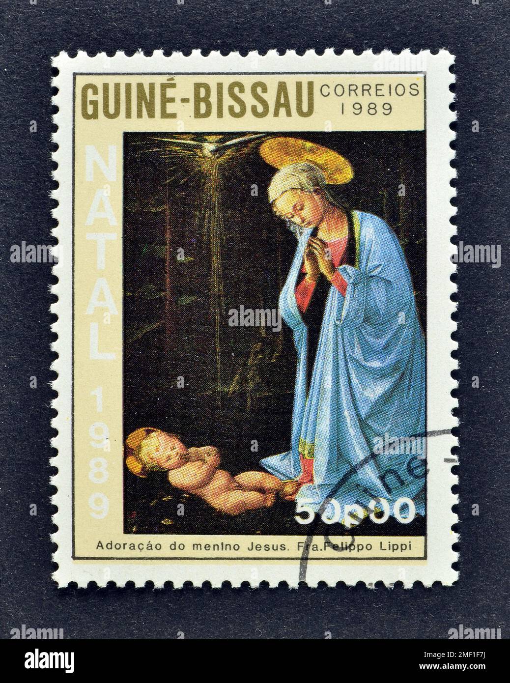 Timbre-poste annulé imprimé par la Guinée-Bissau, qui montre la peinture de FRA Filippo Lippi, Noël 1989, vers 1989. Banque D'Images