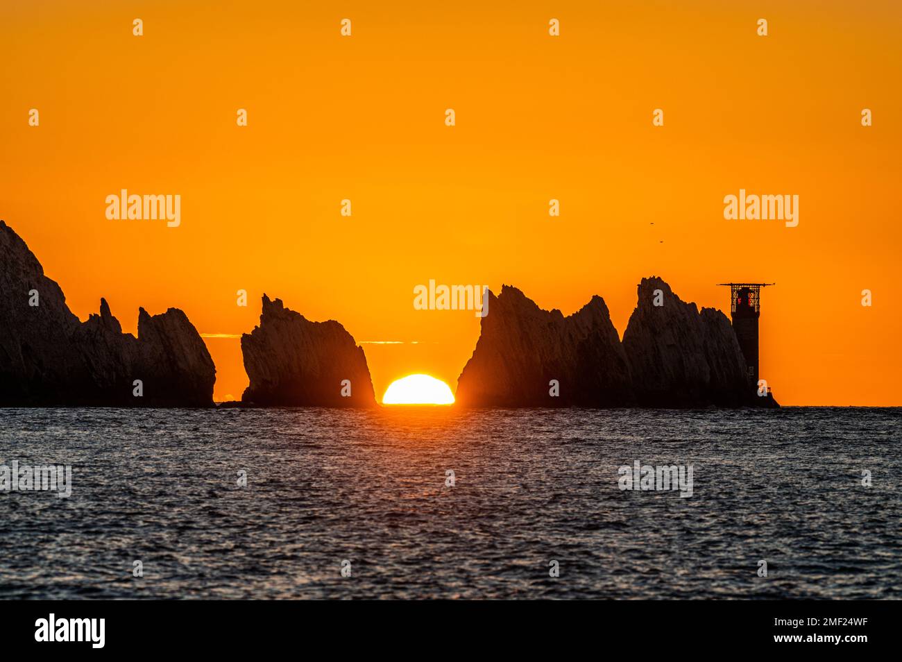 Coucher de soleil à The Needles Rocks, île de Wight Banque D'Images