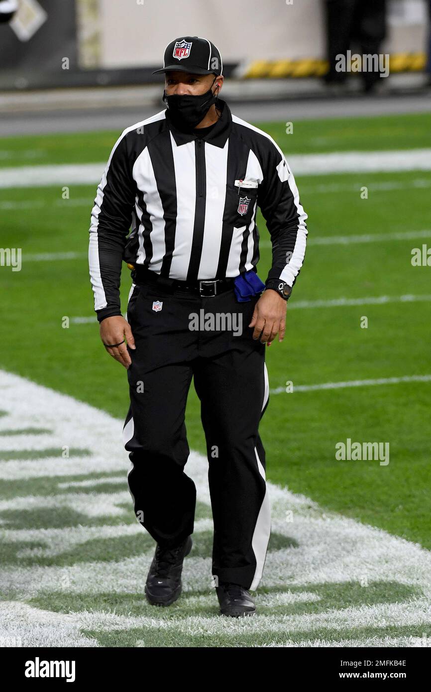 NFL side judge Dominique Pender (114) looks on during an NFL football