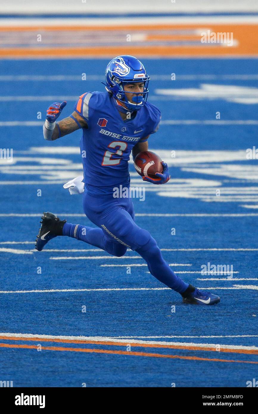 Boise State wide receiver Khalil Shakir (2) runs with the ball in the first half against Utah State in an NCAA college football game Saturday, Oct. 24, 2020, in Boise, Idaho. Boise State won 42-13. (AP Photo/Steve Conner) Banque D'Images