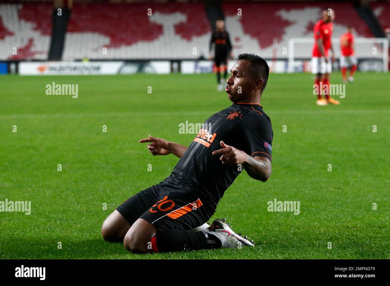 Rangers' Alfredo Morelos celebrates after scoring his side's third goal during the Europa League group D soccer match between Benfica and Glasgow Rangers at the Luz stadium in Lisbon, Thursday, Nov. 5, 2020. (AP Photo/Armando Franca) Banque D'Images