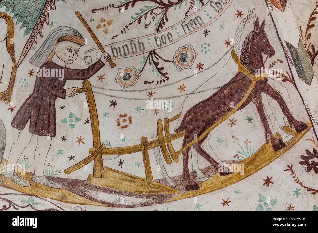 Labourage avec deux chevaux, fresque médiévale à l'église d'Elmelunde, Danemark, 10 octobre 2022 Banque D'Images