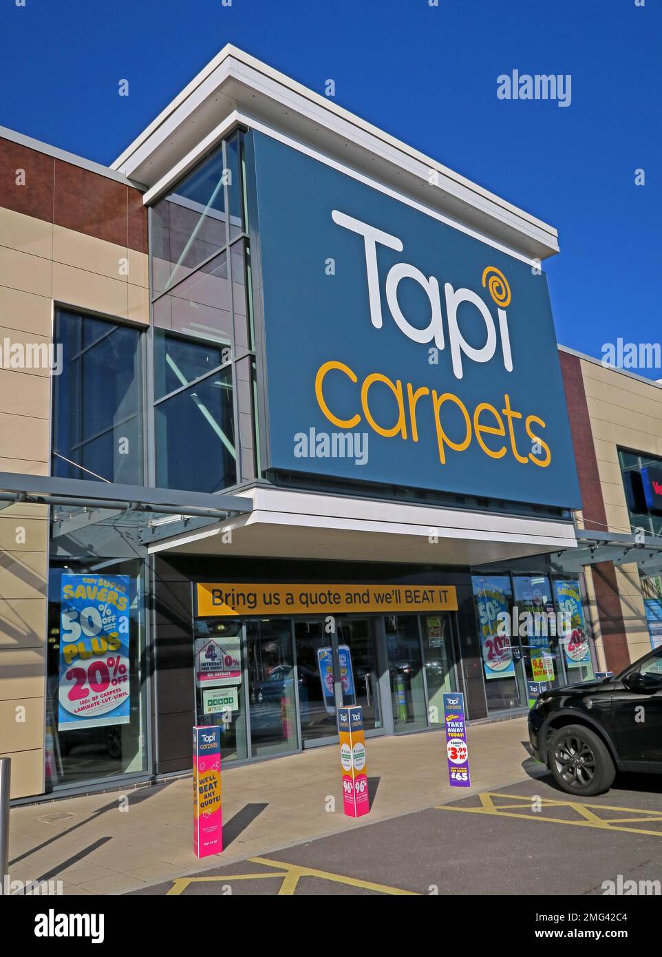 Tapis TAPI, JunctionNINE Retail Park, Warrington, Cheshire, Angleterre, ROYAUME-UNI, WA2 8TW Banque D'Images